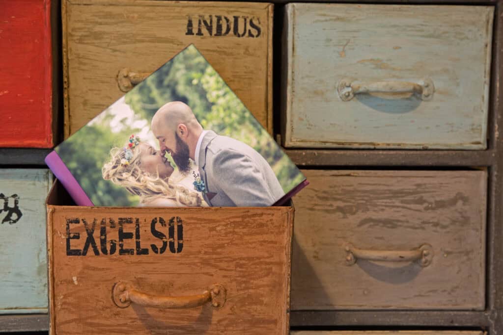 Wedding photo in vintage wooden drawer.